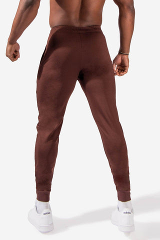 HERMAN&CO UNISEX TAPERED JOGGERS - Tracksuit bottoms - brown 